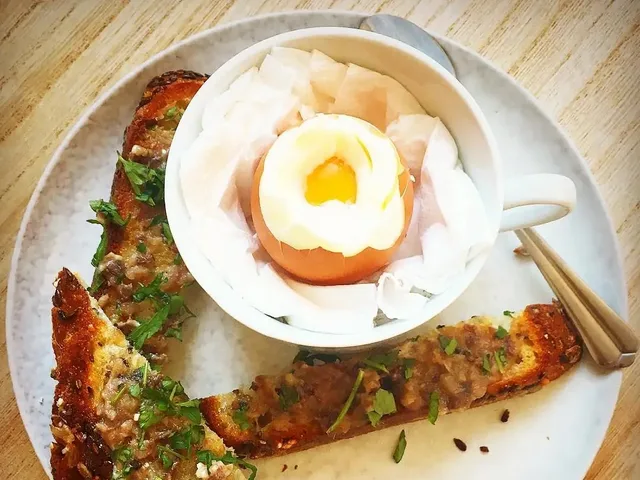Boiled Egg with Anchovy Butter